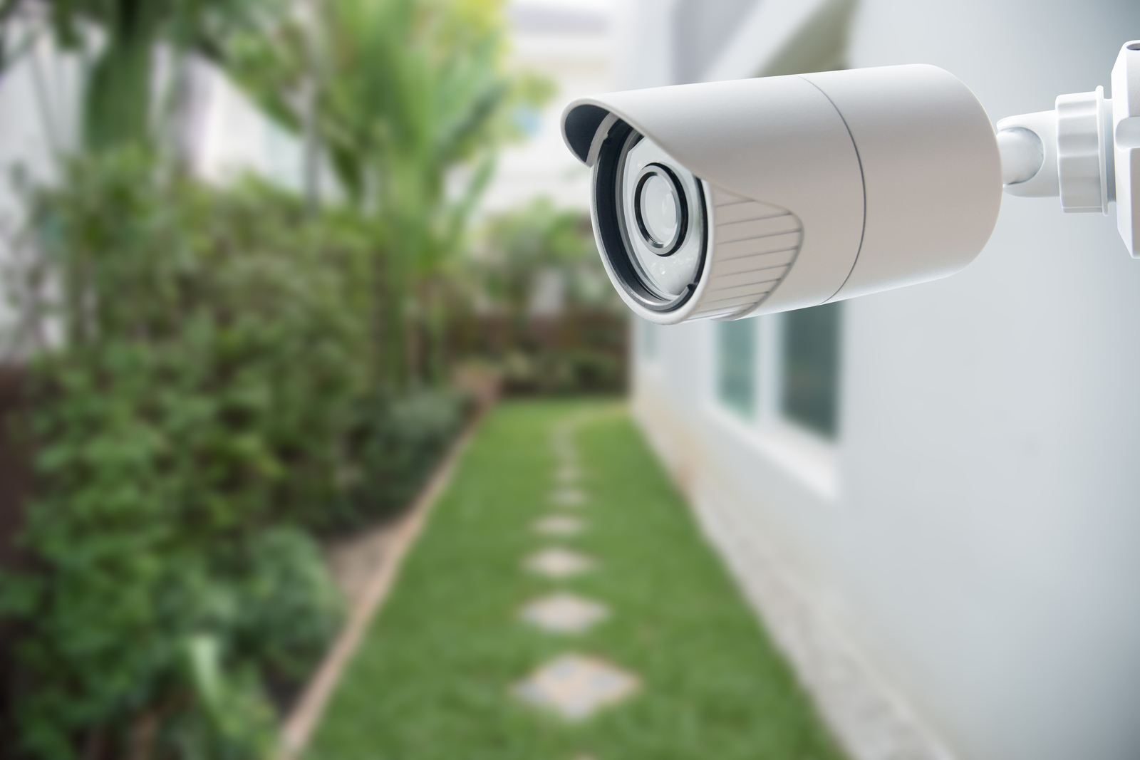 Security camera attached to outside of home