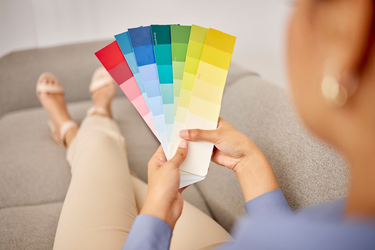 Woman holding multiple swatches