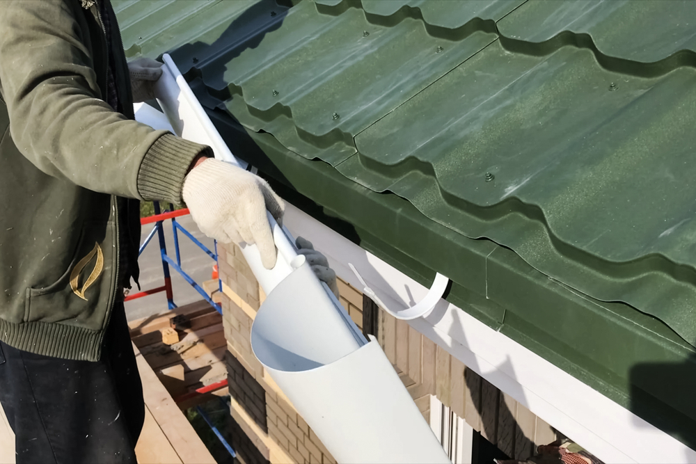 installing guttering spouting to a home