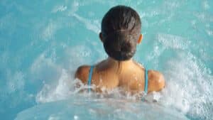 woman in swim spa