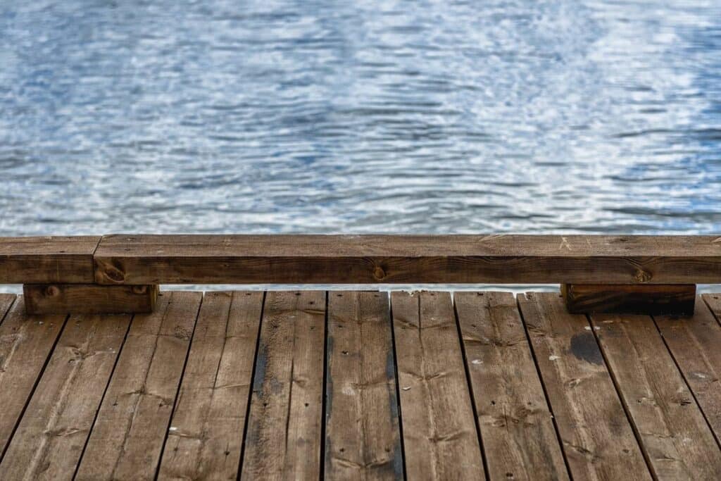 A wooden deck overlooking the water