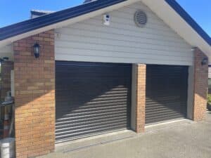 brand new garage roller door on brick garage in auckland