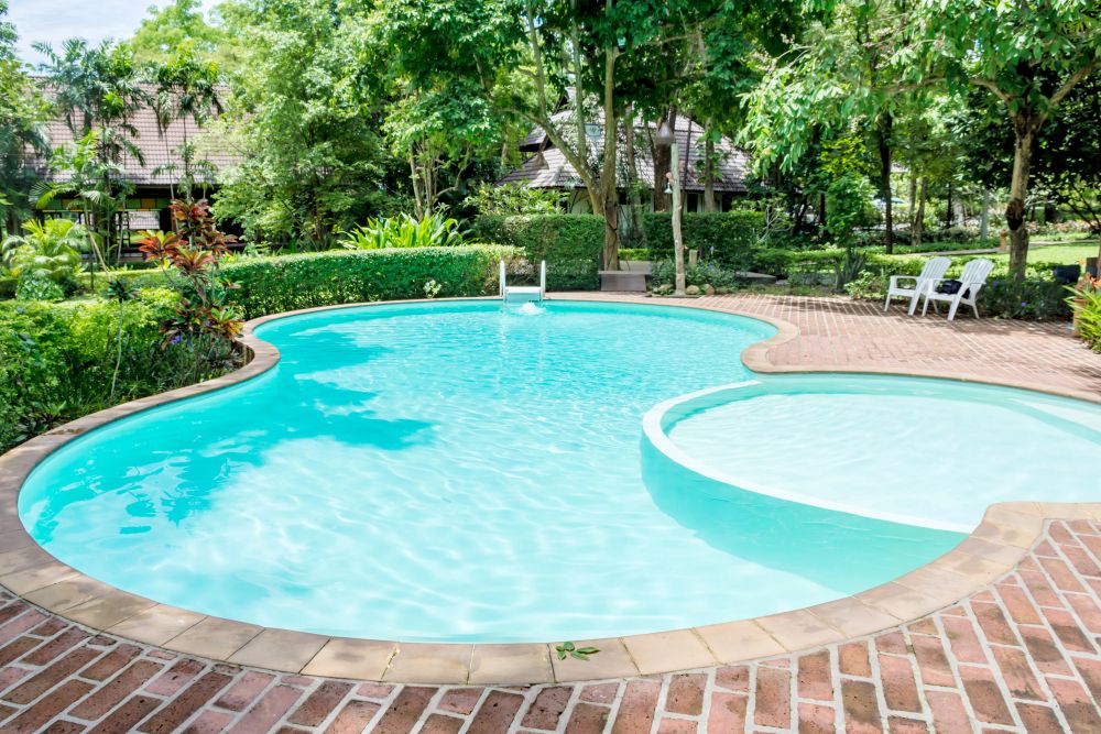 Concrete pool with landscaping