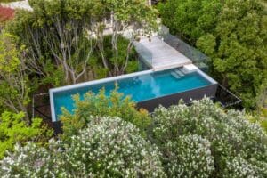 concrete pool in greenery auckland